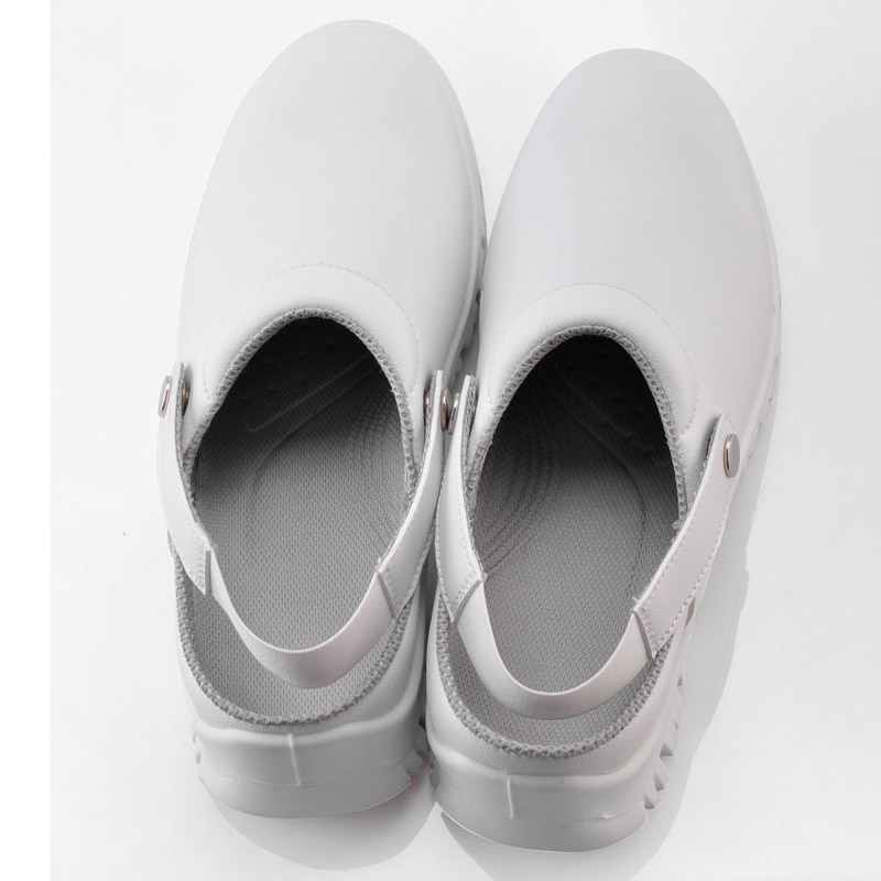 Sapatos de segurança de trabalho com espaço livre para cozinha de restaurante